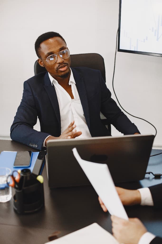 Black hiring manager in a structured interview conversation
